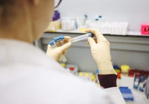 Estimation of Vaccine Effectiveness of CoronaVac and BNT162b2 Against Severe Outcomes Over Time Among Patients With SARS-CoV-2 Omicron